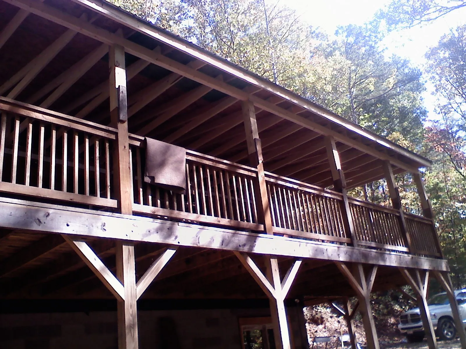 Timber framing under a new elevated porch and deck — Roof Leak Repair in Shingle Springs by Roofing Brothers